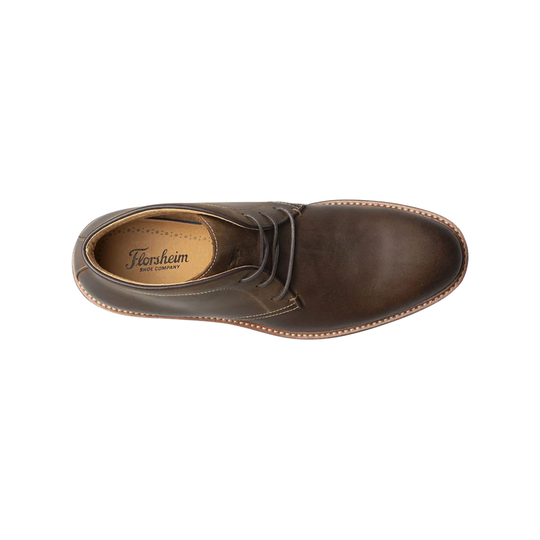 Brown leather shoe with 'Florsheim' branding on a white background