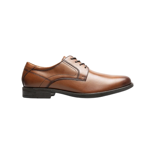 Brown leather dress shoe on a white background