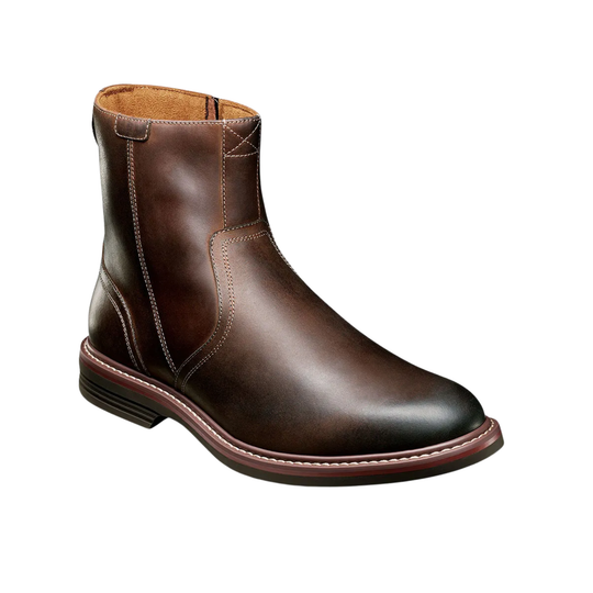 Brown leather boot on a white background