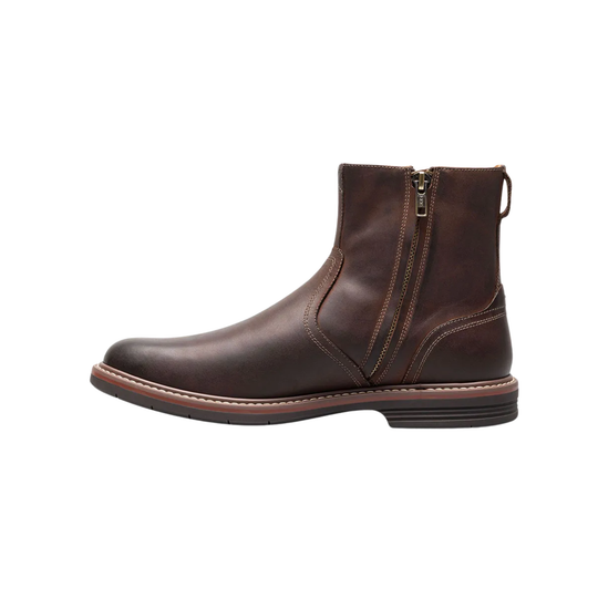 Brown leather boot with a zipper on a white background