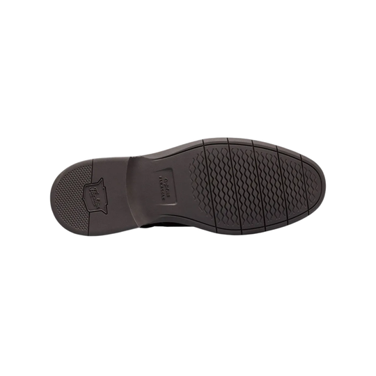 Dark brown shoe sole with brand logo on a white background