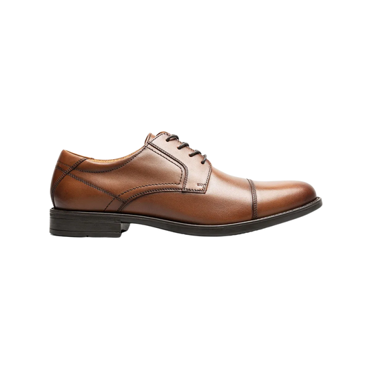Brown leather dress shoe on a white background