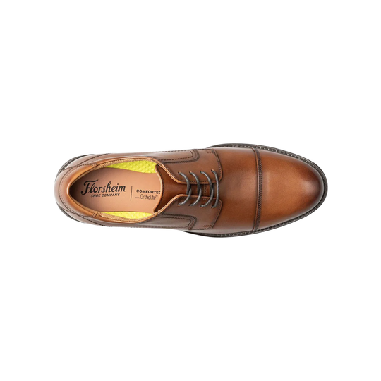 Brown leather shoe with 'Florsheim' branding on a white background
