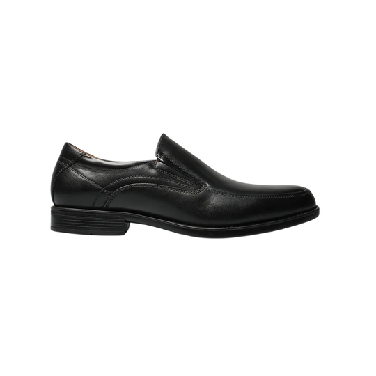 Slip on black shoe on a white background
