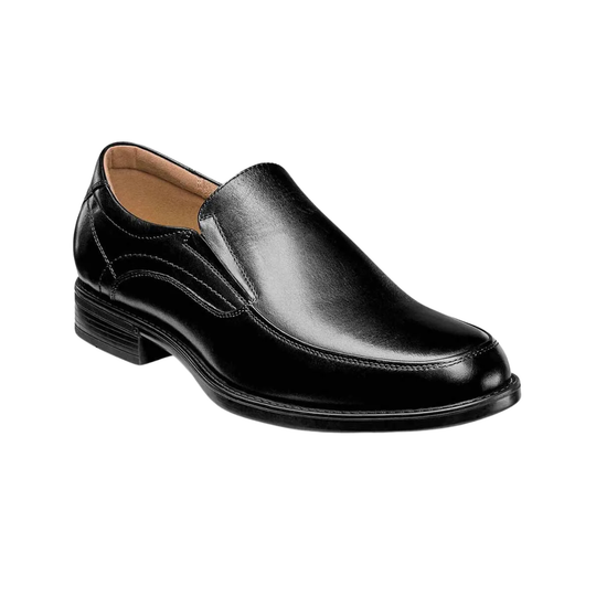 Slip on black shoe on a white background