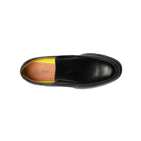 Slip on black shoe with Florsheim logo on a white background
