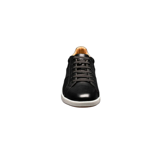 Black leather sneaker on a white background