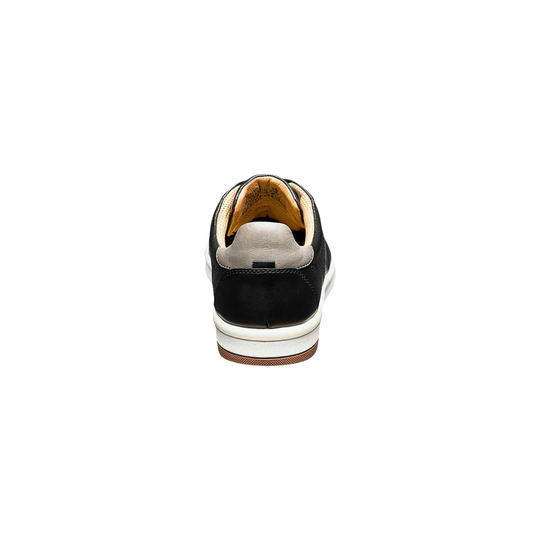 Black sneaker with white sole on a white background