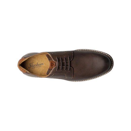 Brown leather shoe with 'Florsheim' branding on a white background