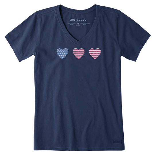 Navy blue t-shirt with heart designs on a white background