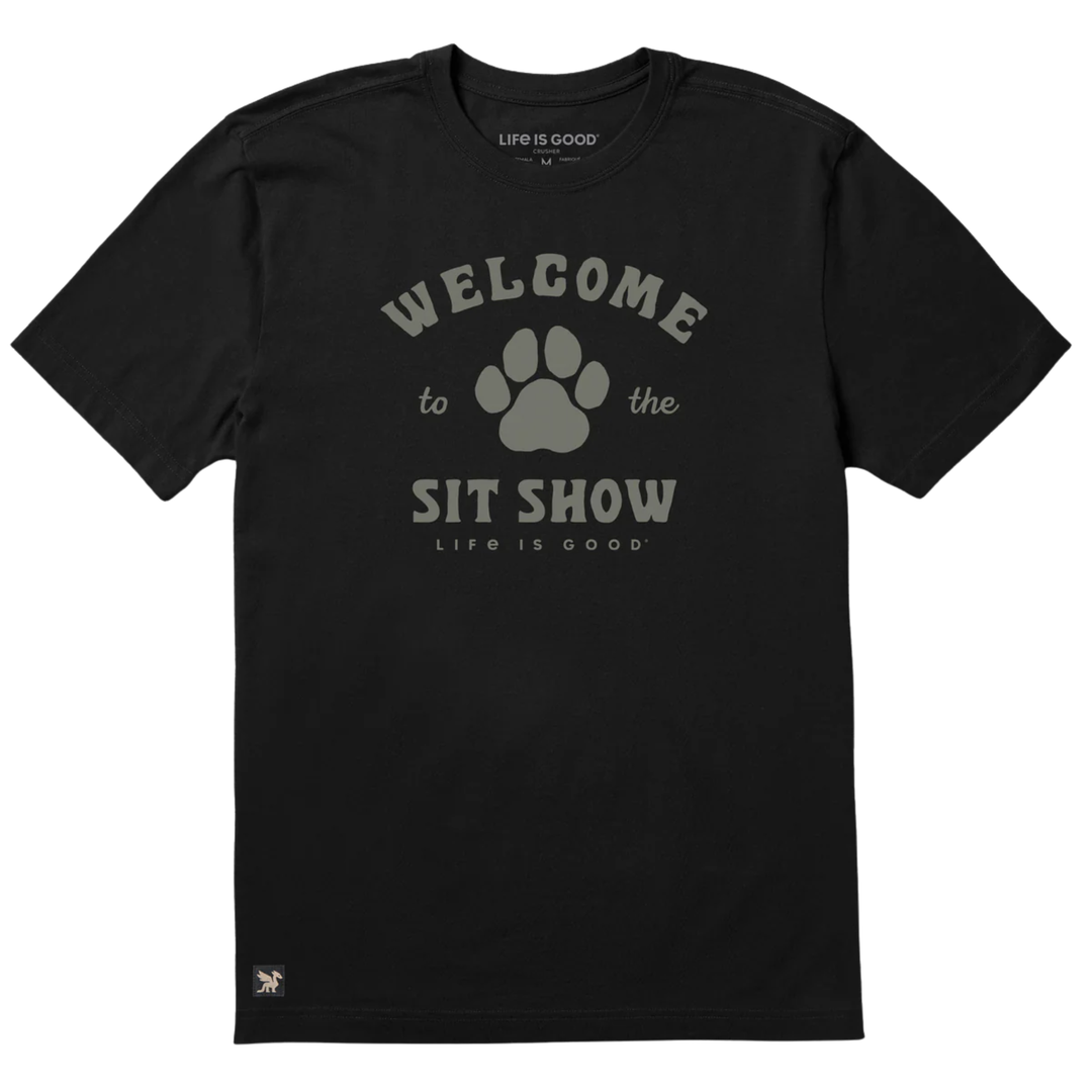 Black t-shirt with 'Welcome to the Sit Show' text and paw print design on a white background