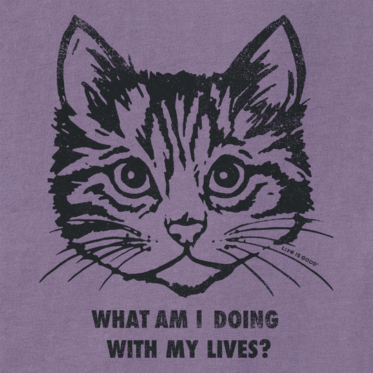 Purple t-shirt with a black cat illustration and text on a purple background