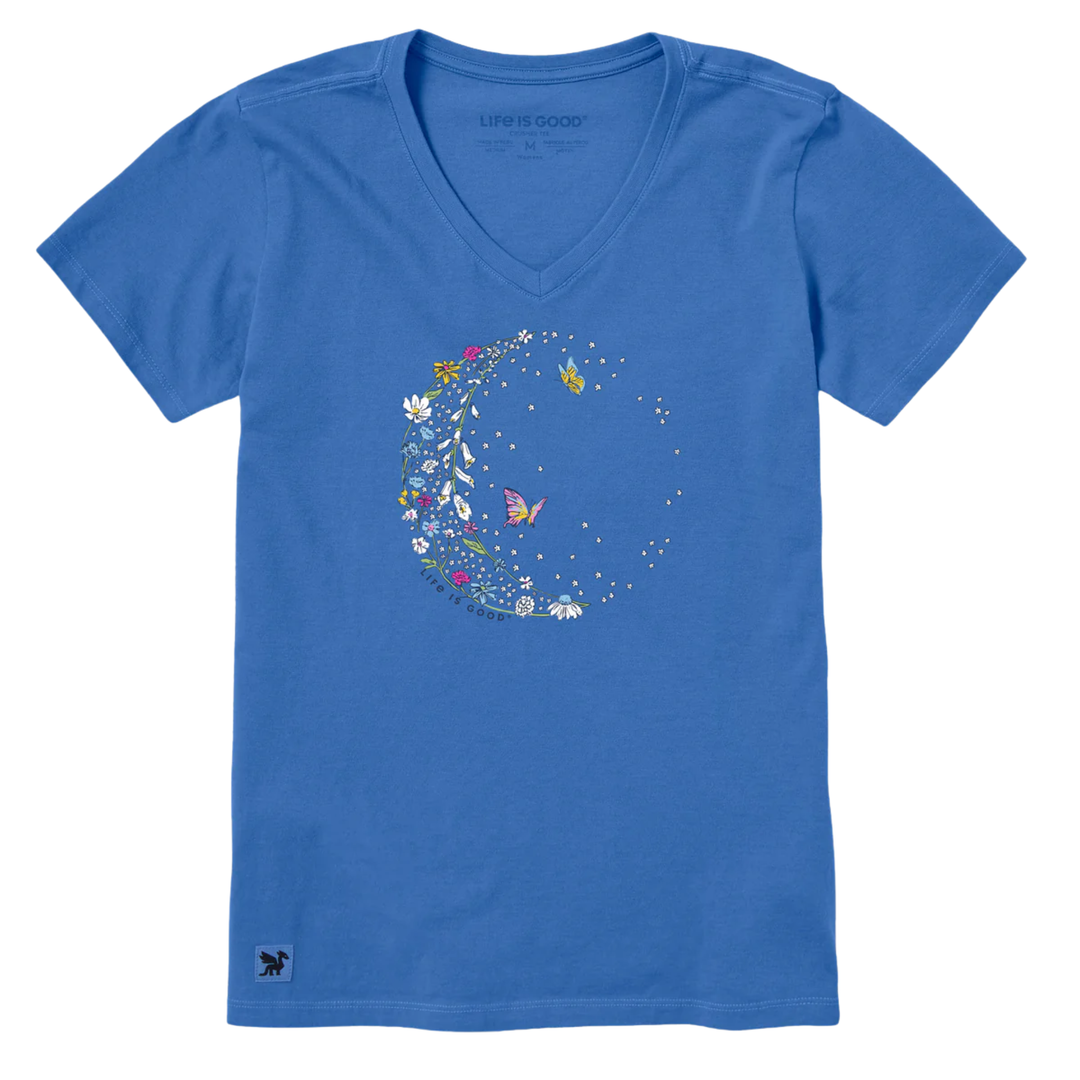 Blue t-shirt with a floral crescent moon design on a white background