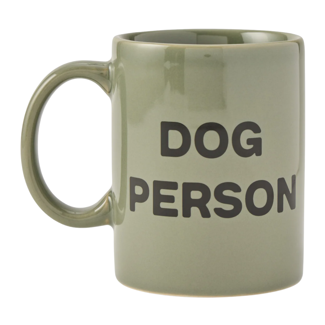 Green mug with 'DOG PERSON' text on a white background