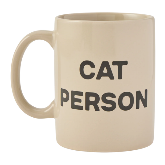 Beige mug with 'CAT PERSON' text on a white background
