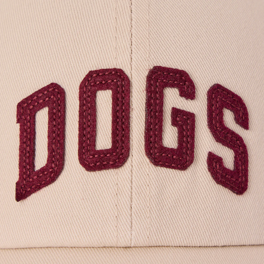 Beige cap with 'DOGS' embroidered in maroon