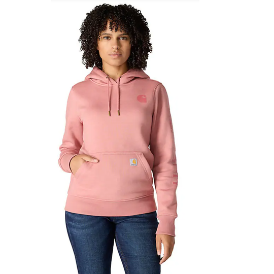 Woman wearing a pink hoodie with a brand logo on a white background