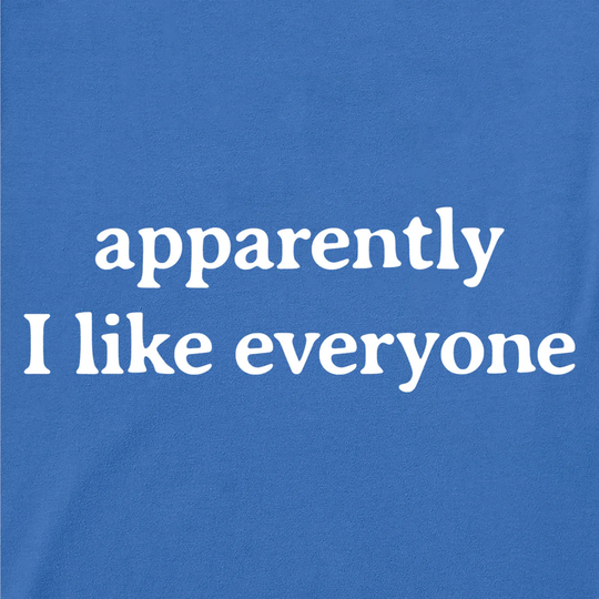 Blue t-shirt with white text 'apparently I like everyone' on a solid blue background