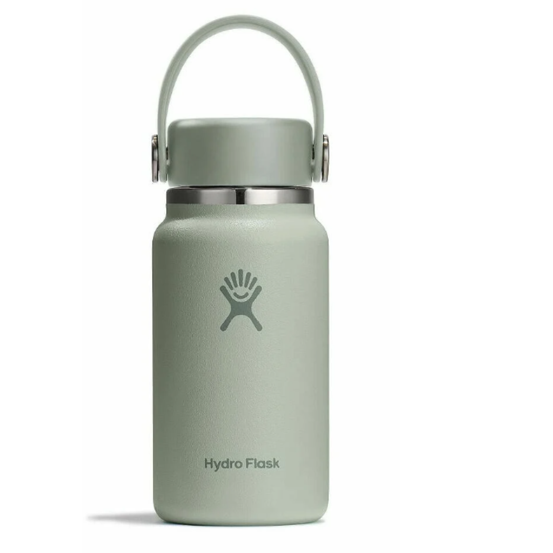 Green Hydro Flask bottle with a white background