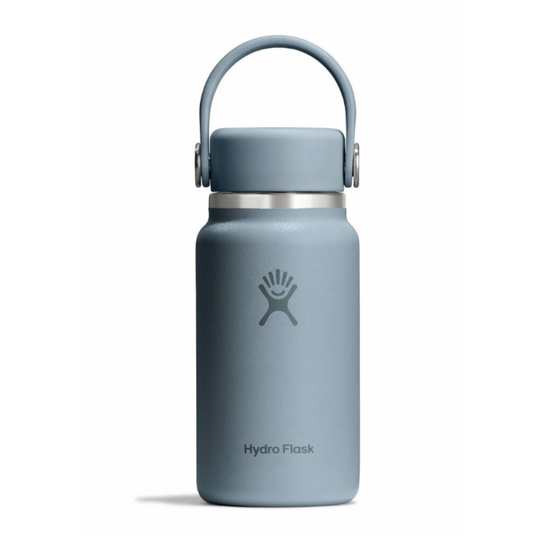Gray Hydro Flask water bottle with a silver lid on a white background