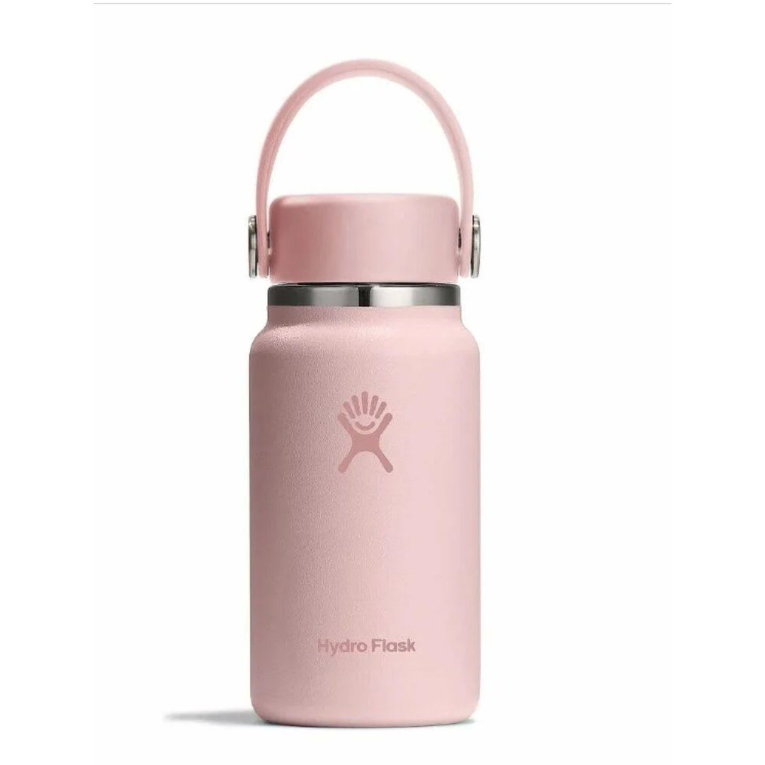 Pink Hydro Flask water bottle with a handle on a white background