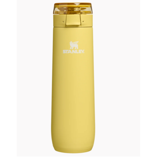 Yellow Stanley water bottle on a white background