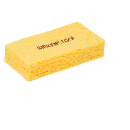 Yellow cleaning sponge with 'Birkenstock' branding on a white background
