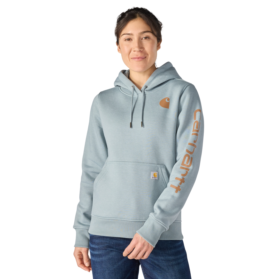 Person wearing a light blue hoodie with a brand logo on a white background