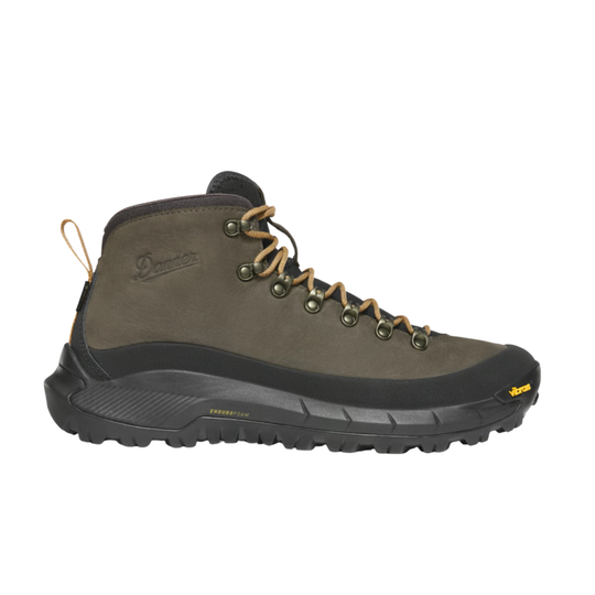 Brown hiking boot with black sole on a white background
