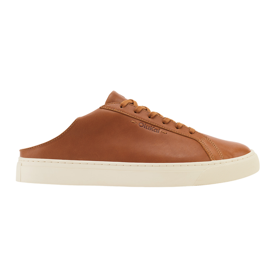 Brown sneakers with white soles on a light gray background