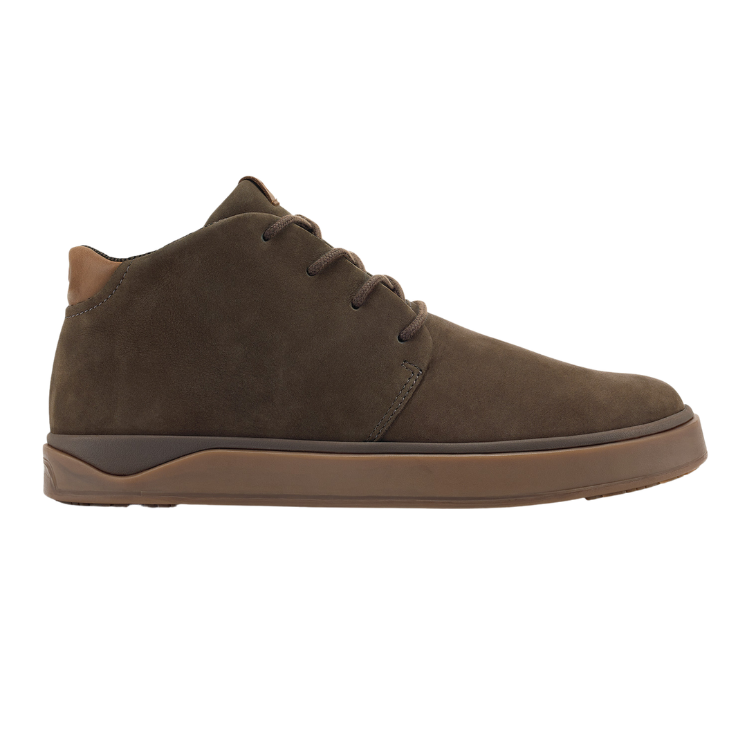 Brown suede sneaker on a white background