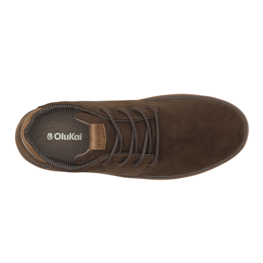 Brown suede shoe with laces on a white background