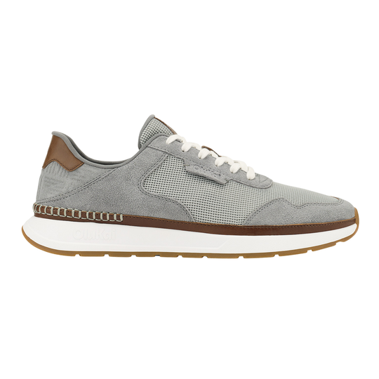 Beige sneaker with colorful accents on a white background