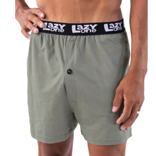 Person wearing gray shorts with a black waistband featuring 'Lazy One' branding.