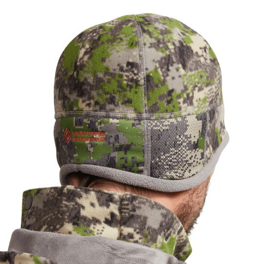 Camouflage beanie with hunting design on a white background