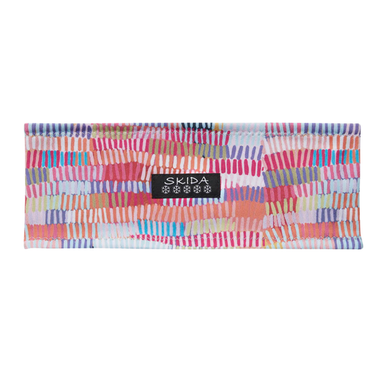 Multi color Penny Lane headband with skida logo on white background