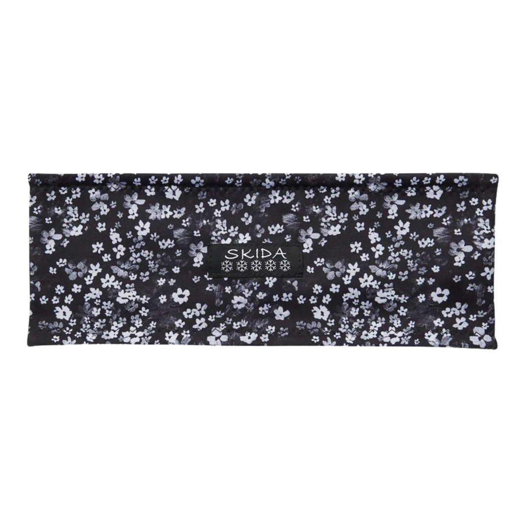 Black and white flower print headband on white background