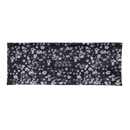 Black and white flower print headband on white background