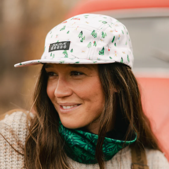 Skida Original Brim Hat - Nordland white and green pine tree print on blurred out background