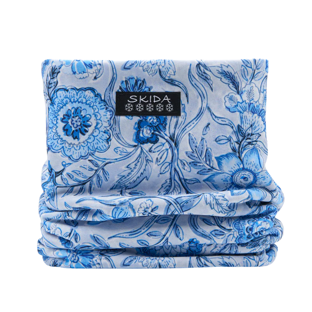Skida Alpine Fleece Neckwarmer - Amrita blue flower design on a white background. 