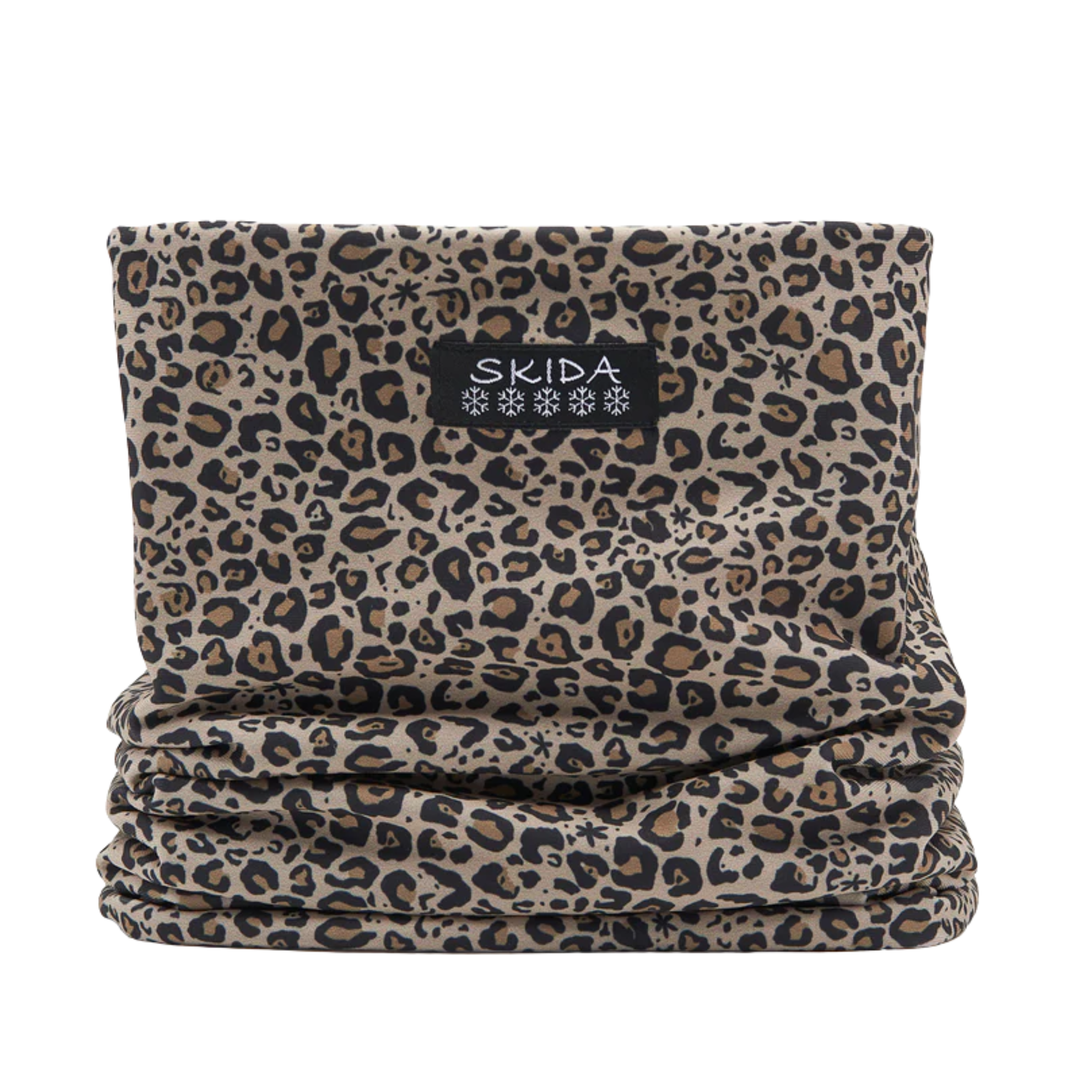 Leopard print neck gaiter with 'Skida' logo on a white background