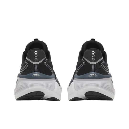 back heels of black and grey women's saucony shoe on white background