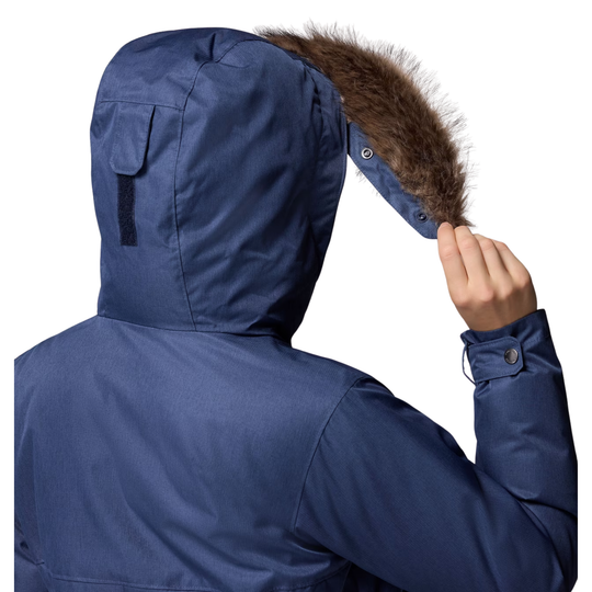 back of hood with fur detachable woman wearing Columbia Women's Suttle Mountain Long Insulated Jacket - Collegiate Navy on white background