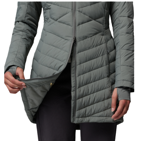 bottom part of jacket showing zipper split function. woman wearing Columbia Women's Joy Peak II Mid Hooded Jacket - Sedona Sage on white background