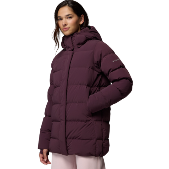 Woman wearing Columbia Women's Amaze Puff Mid Hooded Jacket - Moonvista on white background