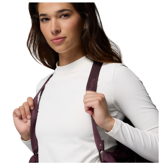 Woman wearing Columbia Women's Amaze Puff Mid Hooded Jacket - Moonvista on white background. jacket off shoulders being held by suspender like material