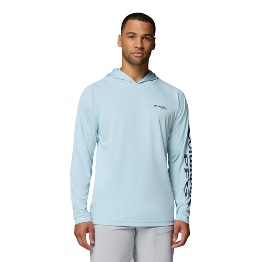 man wearing Columbia Men's PFG Terminal Tackle Hoodie - Marine Light on white background