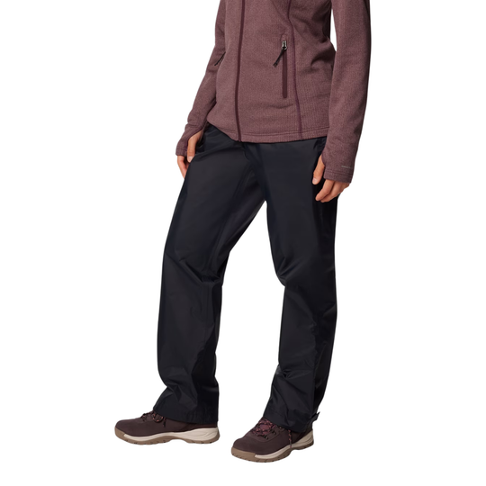 side of woman wearing Columbia Women's Storm Surge II Pants - Black on white background