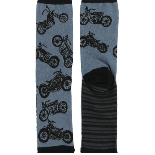 A pair of blue crew socks with a black motorcycle pattern on the leg and a black and gray striped pattern on the foot, shown against a plain white background.