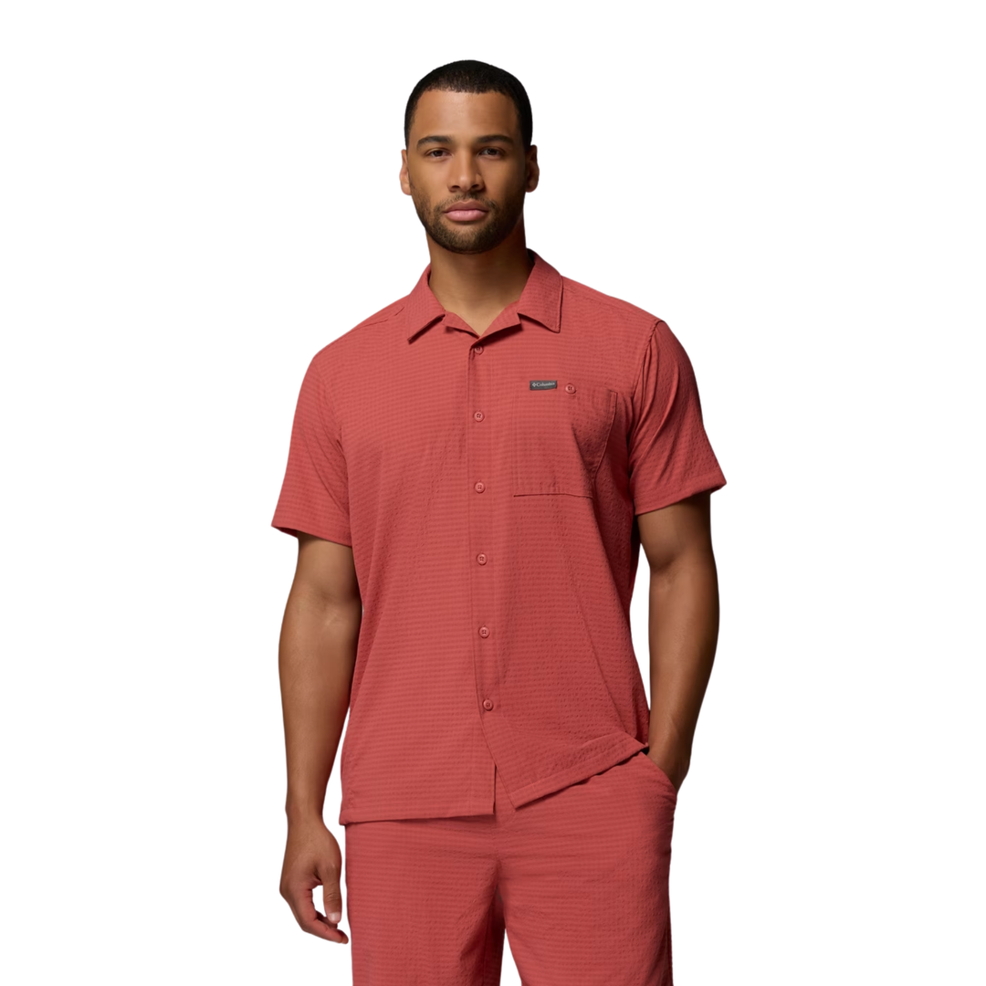 man wearing Columbia Men's Utilizer Short Sleeve Camp Shirt - Washed Red on white background